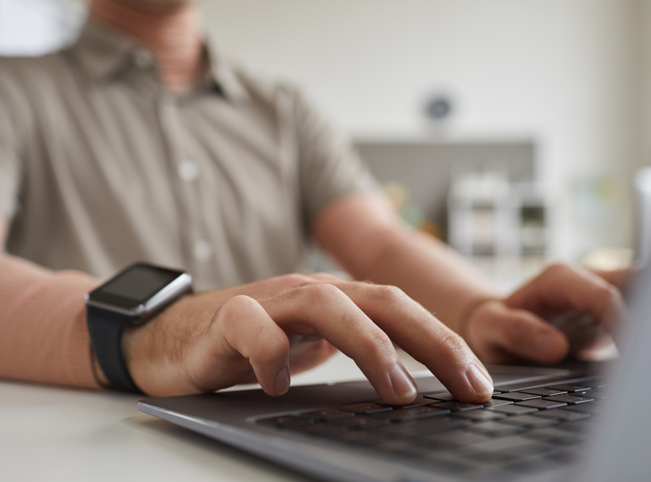 typing on laptop